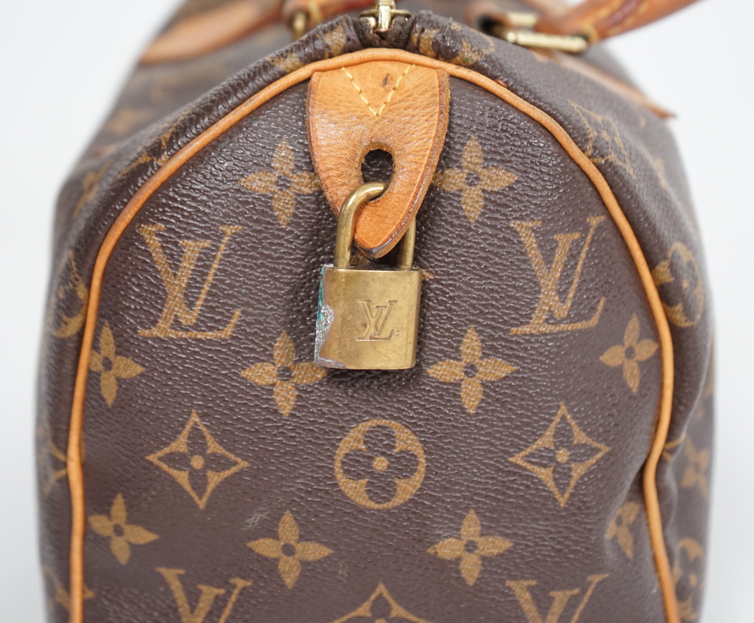 A vintage Louis Vuitton Monogram canvas Speedy 25 handbag, a Louis Vuitton Pochette Accessories Canvas bag and small Agenda PM Speedy bag: width 25cm, height overall 29cmm depth15cm, Pochette Bag: width 22cm, height 13cm